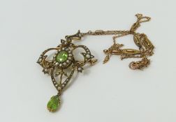 An Edwardian peridot and split pearl pendant/brooc