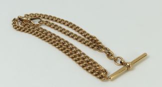 A 9ct rose gold Albert chain, with a T bar and swi