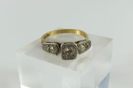 An early 20th century diamond ring, the central ol