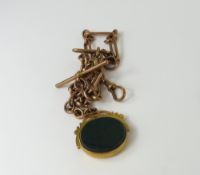 A rose gold trombone and oval link watch chain, th
