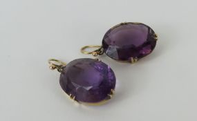 A pair of large amethyst drop earrings, the oval f