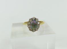 A 20th century black opal and diamond cluster ring