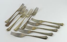 Ten silver table forks