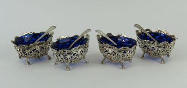 Four silver salt pots