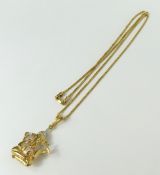 A diamond and pearl set pendant in the form of the
