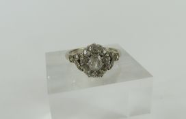 An early to mid-20th century white gold diamond cl