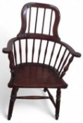 A stained open armchair
