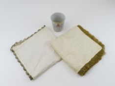 A Victorian embroidered cloth with peacock central motif