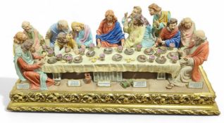 A Capodimonte religious figural group of The Last Supper on gilt plinth