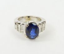 A white gold contemporary blue sapphire (natural w