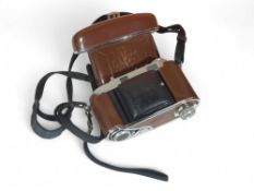 A collection of cameras and camera equipment