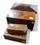 Four wooden boxes of differing sizes and designs.