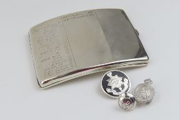 A silver cigarette case, along with three smaller