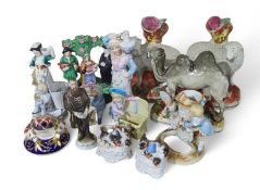 A collection of porcelain figurines, including