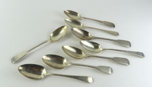 Eight silver serving spoons