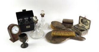 A collection of silverware and other items