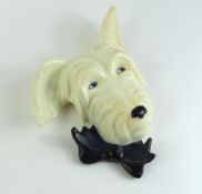 A Beswick Sealyham small porcelain wall hanging in the form of a te