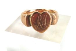 A 9ct rose gold signet ring with heart shaped head