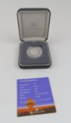 A five dollar 2002 Australian silver proof coin