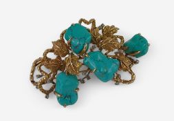 An unusual large brooch, set with polished free fo