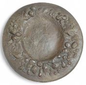 A oval iron decorative hanging plate