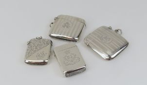Four silver vesta cases, two of a similar size, wi