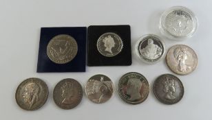 A collection of UK and Commonwealth commemorative coins