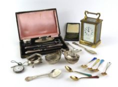 A collection of silverware and other items