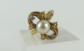 A 9ct gold cultured pearl and white stone dress ri