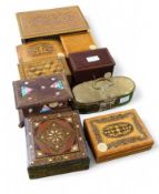A collection of nine small boxes. Includes a round