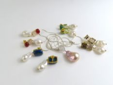 Four pairs of drop earrings from 'The Golden Age Pearl Collection'