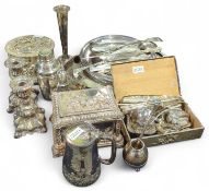 A silver plated jewellery casket with embossed decoration
