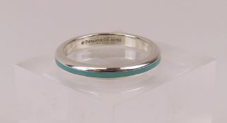 Tiffany and Co - a silver and enamel band ring with turquoise inlay