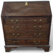 A stained-oak bureau