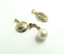 A 9ct gold diamond set pendant, another diamond se