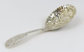 A 17th century heavily decorated silver caddy spoon