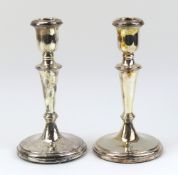 A pair of silver candlesticks