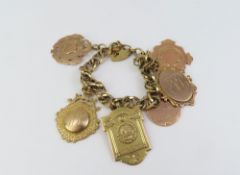 A 9ct gold bracelet composed of oval and round rope links