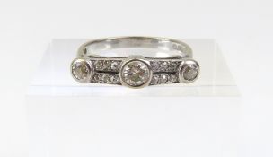 An 18ct white gold Art Deco style diamond ring, th