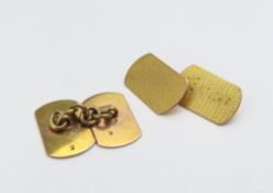 A pair of 9ct gold cufflinks, each end of cut-cornered rectangular outline
