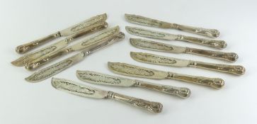 Eleven Victorian silver fish knives