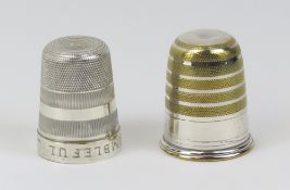Two novelty measuring cups