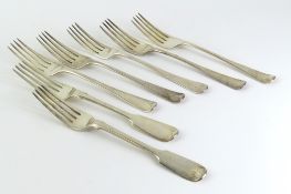 Seven silver table forks