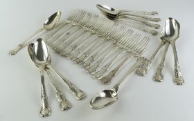 A collection of silver flatware
