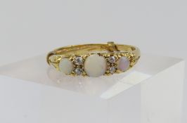 A 19th or early 20th century 18ct gold white opal