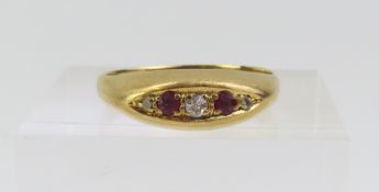An 18ct gold ruby and diamond ring, all set into a