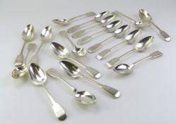 A collection of eighteen silver dessert spoons