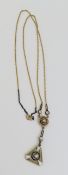 An Edwardian enamel, seed pearl and diamond neckla