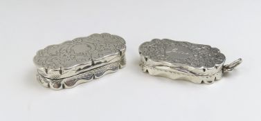 A pair of small silver vinaigrettes