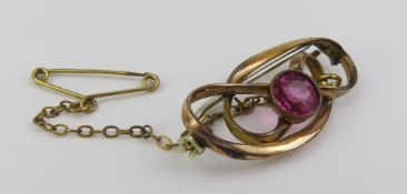 A Charles Horner gold plated brooch, with a hot pi